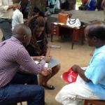 Legal consultation between migrant mineworker and LHR staff in Mozambique